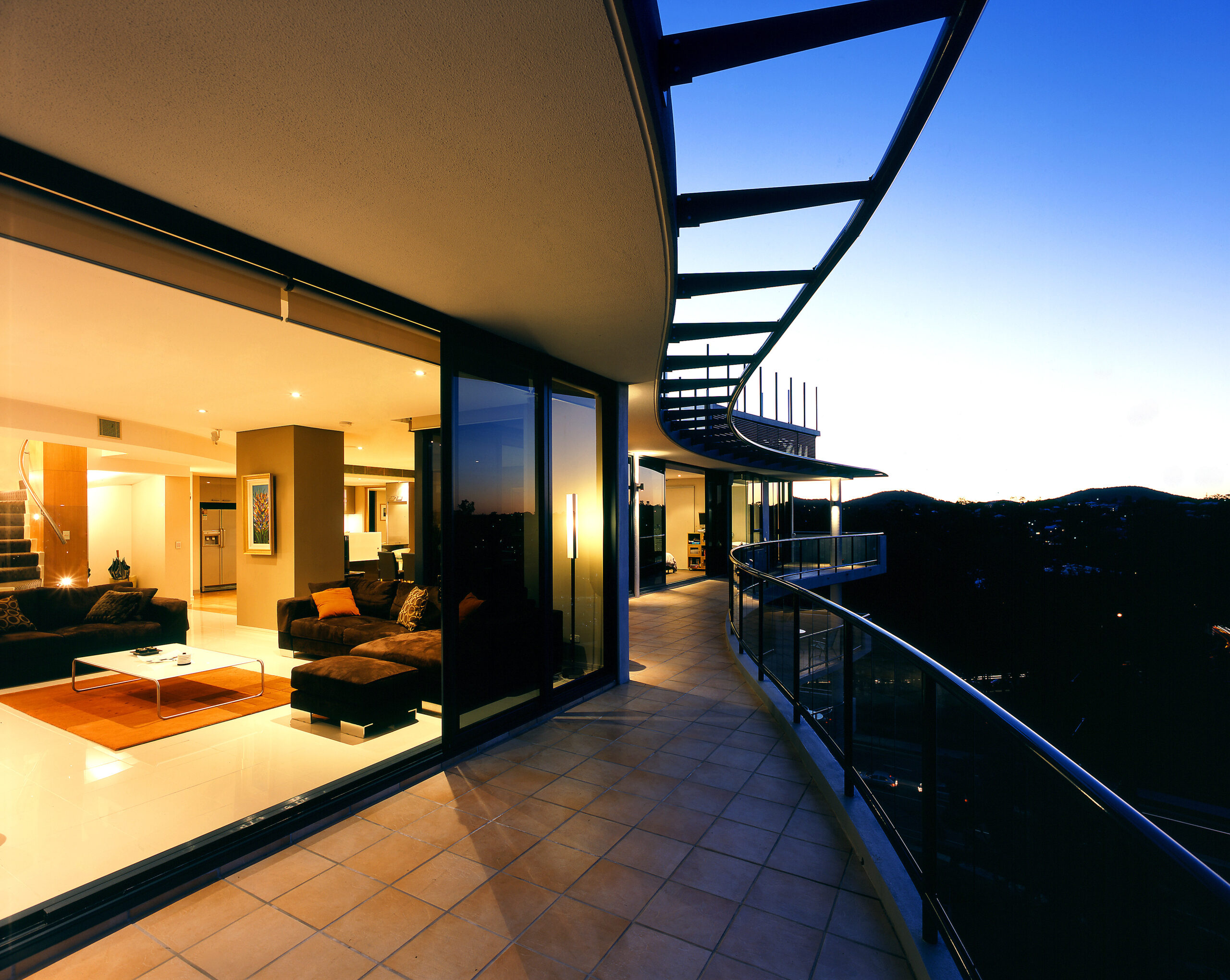 View across the balcony of a penthouse apartment showcasing scenic views towards the west of Brisbane