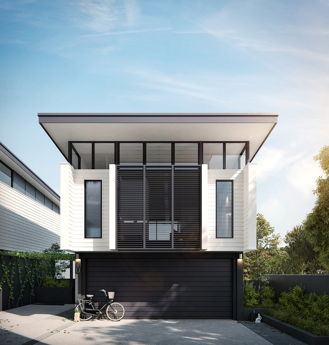 Front view of a Duplex Townhouse showcasing a sleek black ground floor and a pristine white upper floor, adorned with timber cladding and aluminum battening. Abundant natural light floods the interior through the sloped roof windows.