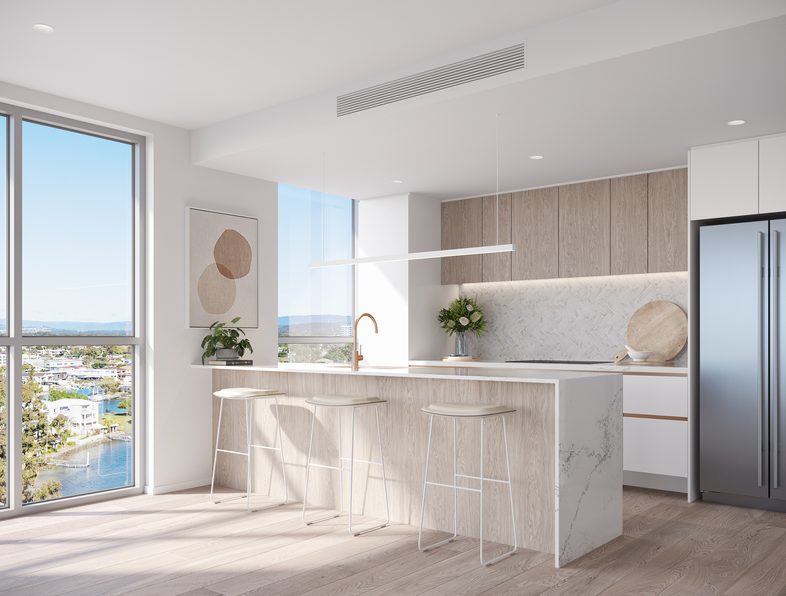 Stylish apartment kitchen with warm timber floors and elegant white marble counter benchtops. The kitchen features an island breakfast bar adorned with sleek metal stools, while floor-to-ceiling glazing floods the interior spaces with abundant natural light.