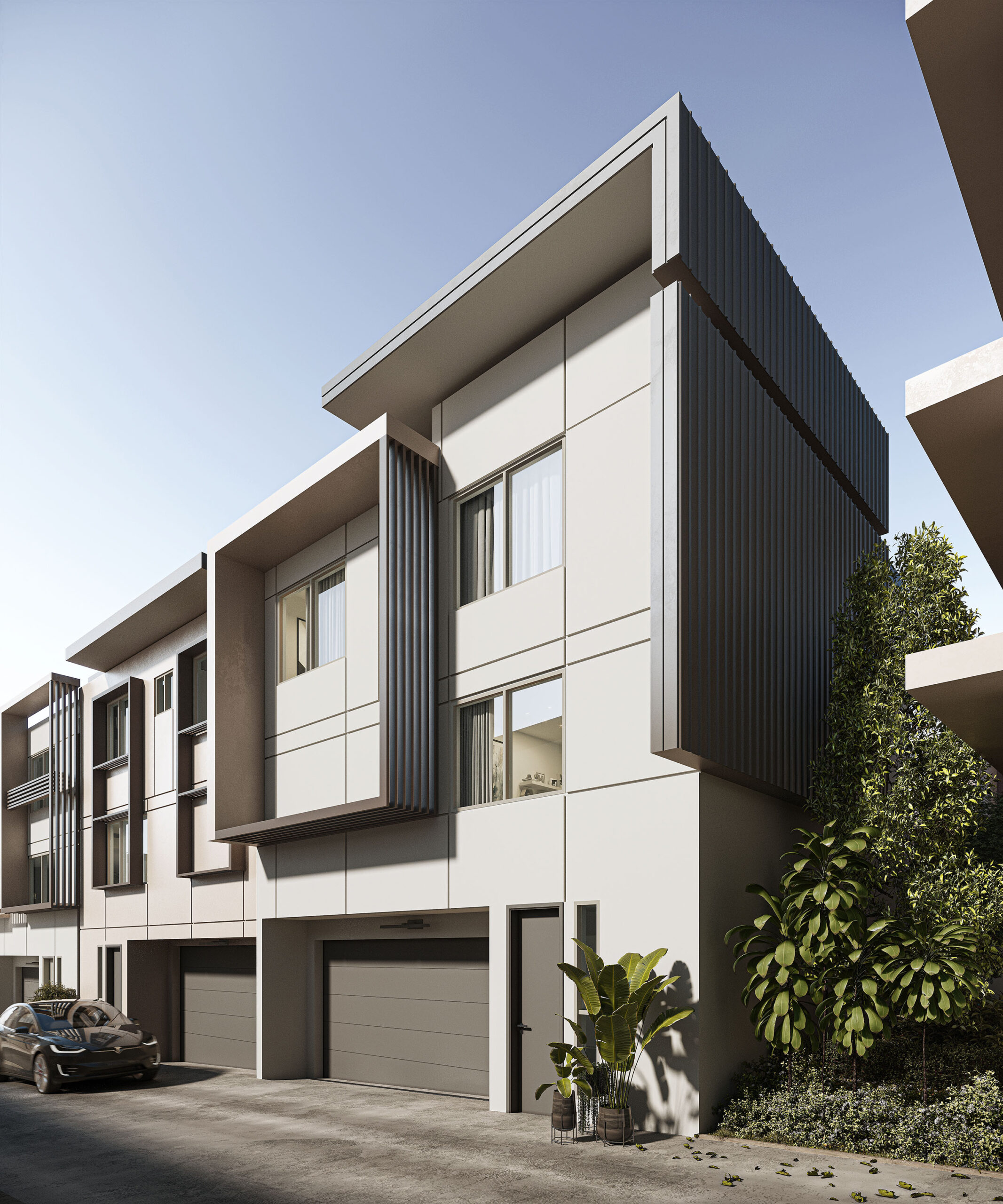 Modern Armida Residences townhouse duplex with striking architectural framing elements and a seamlessly integrated roof design, ideal for showcasing the expertise of our architectural firm