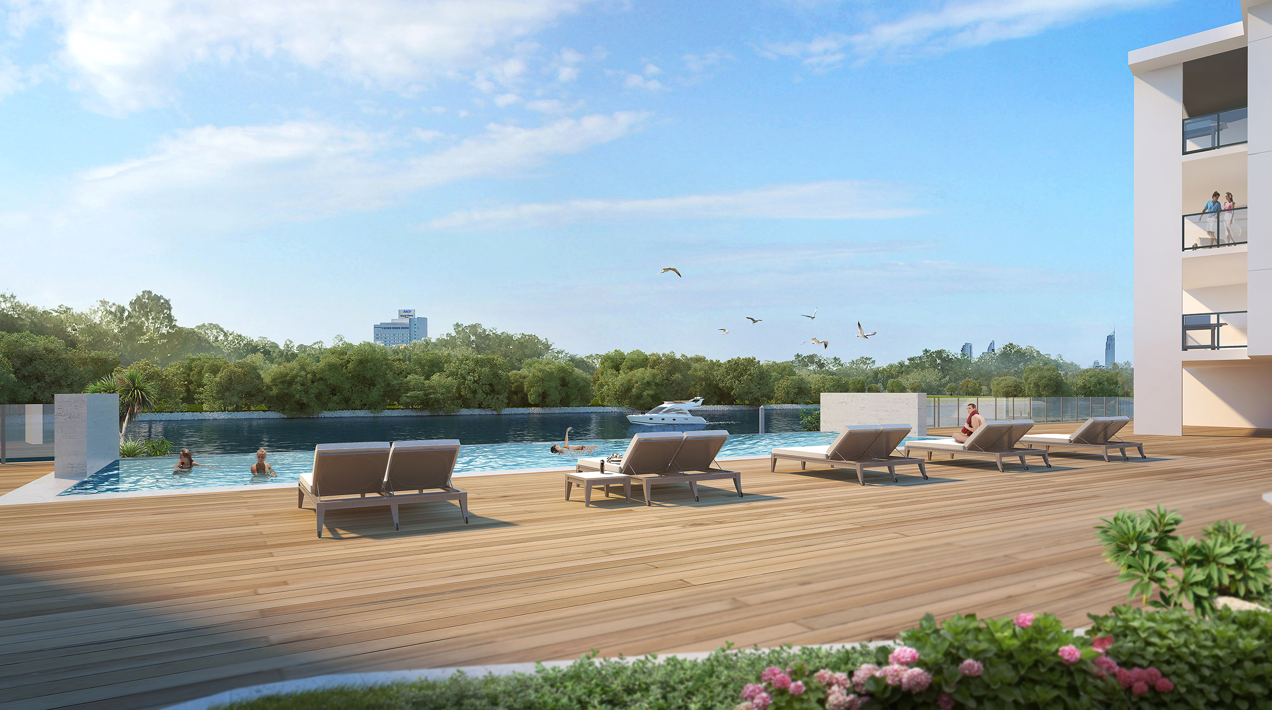 view from the pool deck of the riverfront residences showcasing the river side infinity pool